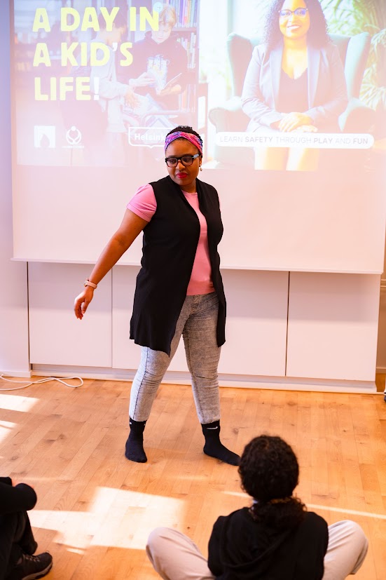 Facilitator performing during a Safety Club session