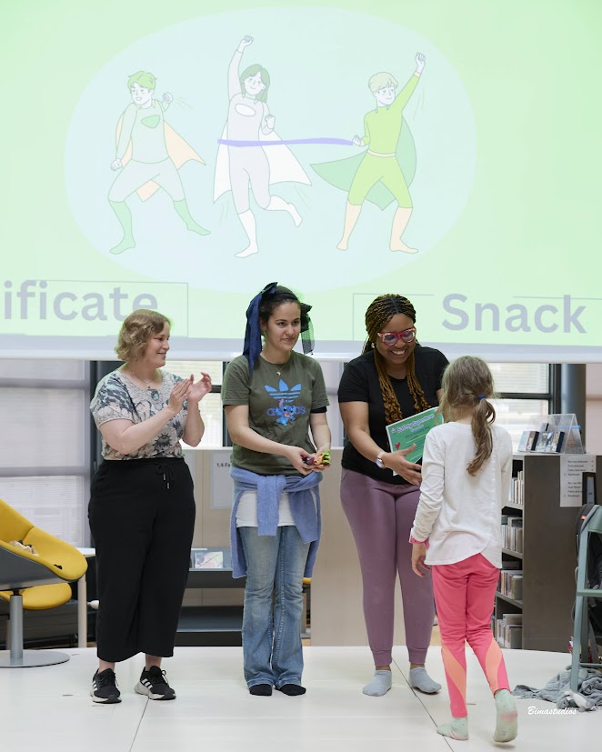 Certificate ceremony with young participant